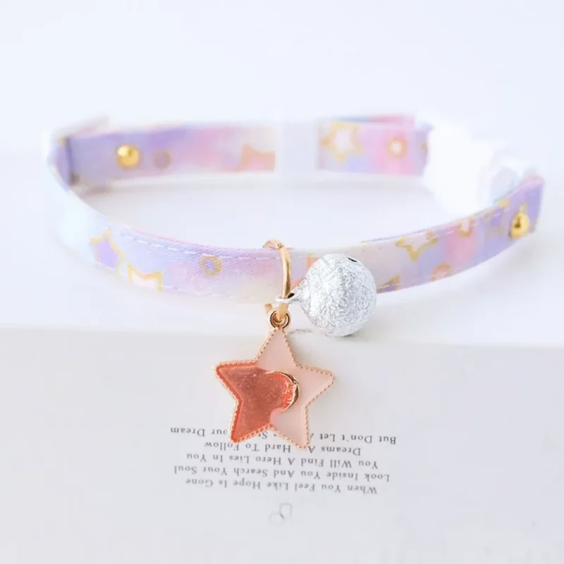 purple collar with bell and star