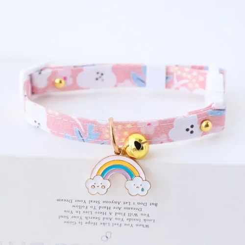 pink collar with bell and rainbow